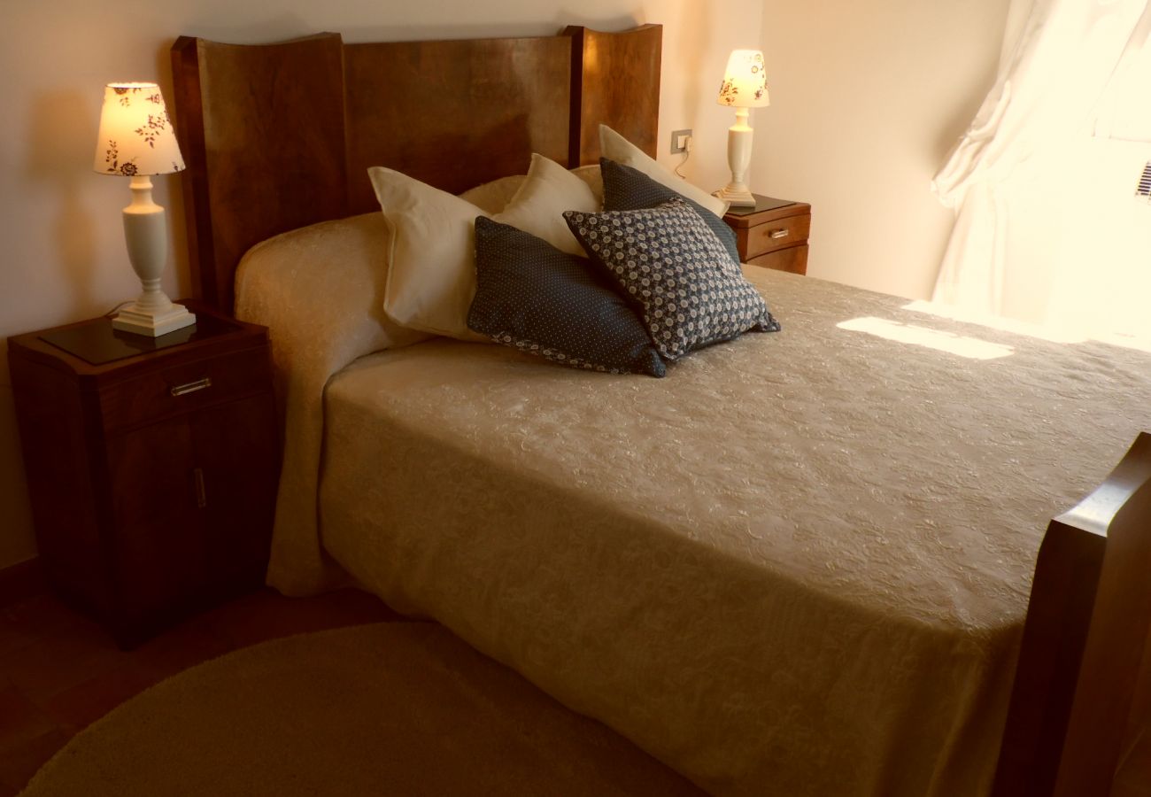 bedroom with queen size bed in the country house by Lake Bolsena bedroom with queen size bed in the country house by Lake Bolsena